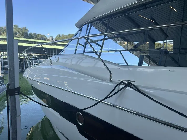 Velkommen Yacht Photos Pics 2022 Prestige 460F yacht docked in marina, showcasing sleek design and modern features.