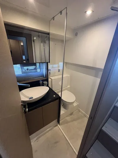 Velkommen Yacht Photos Pics Modern bathroom in 2022 Prestige 460F yacht with sleek fixtures and elegant design.