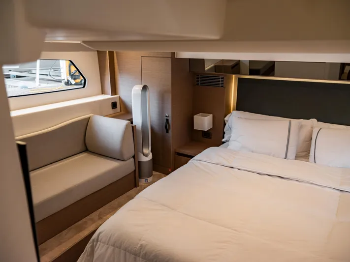 Velkommen Yacht Photos Pics Luxurious bedroom interior of 2022 Prestige 460F yacht with modern furnishings.