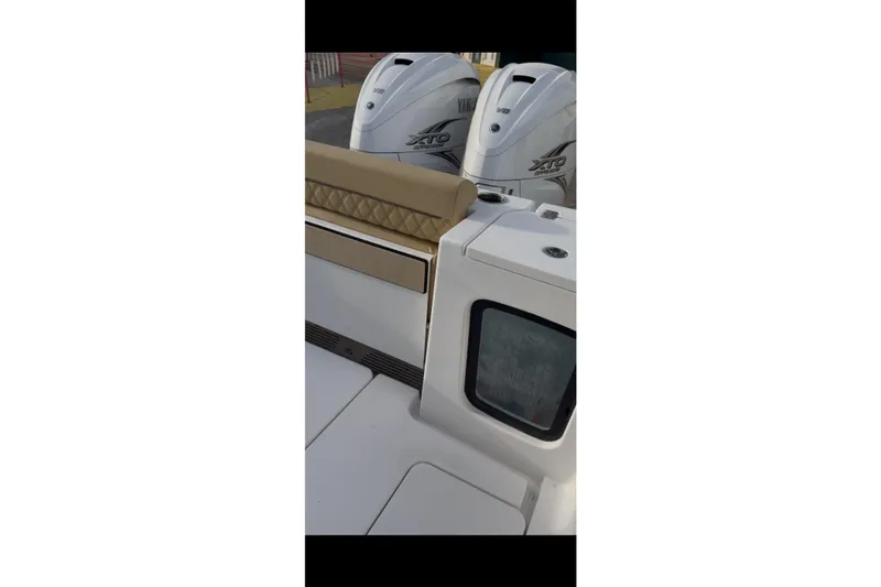  Yacht Photos Pics 2023 Sportsman Open 322 Center Console with Yamaha engines, rear seating view.