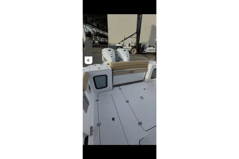  Yacht Photos Pics 2023 Sportsman Open 322 Center Console boat interior with dual engines and seating.