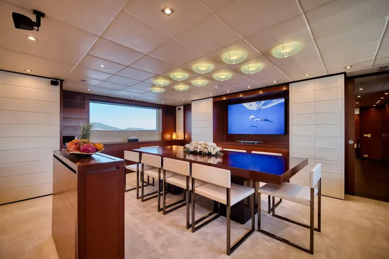  Yacht Photos Pics Luxurious dining area on 2007 Baglietto 43 yacht with elegant decor and modern lighting.