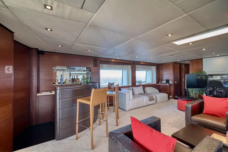  Yacht Photos Pics Luxurious 2007 Baglietto 43 yacht interior with bar, seating, and ocean view.