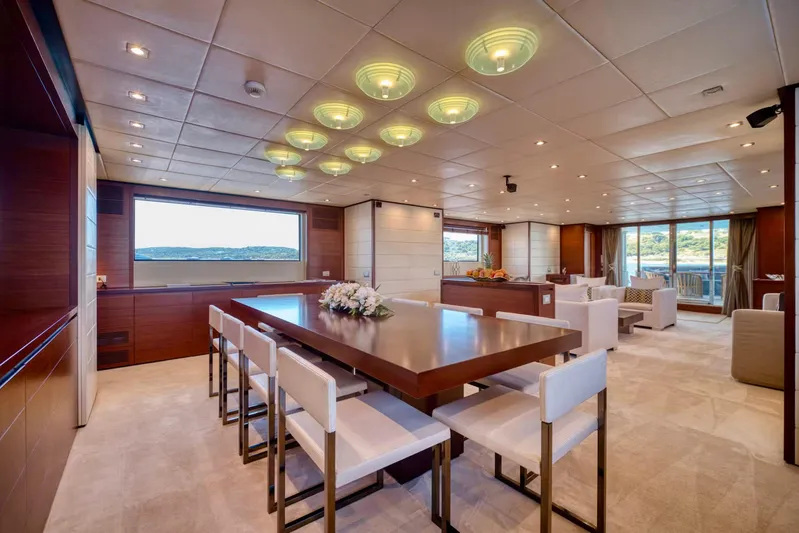  Yacht Photos Pics Luxurious interior of 2007 Baglietto 43 yacht with elegant dining area and scenic views.