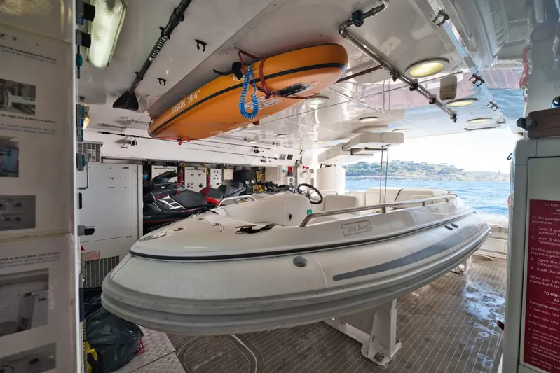  Yacht Photos Pics Interior of 2007 Baglietto 43 yacht with inflatable boat and equipment storage.