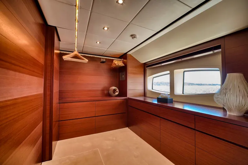  Yacht Photos Pics Luxurious wooden interior of 2007 Baglietto 43 yacht with elegant decor and sea view.
