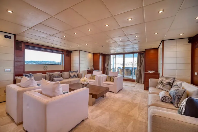  Yacht Photos Pics Luxurious interior of 2007 Baglietto 43 yacht with elegant seating and panoramic views.