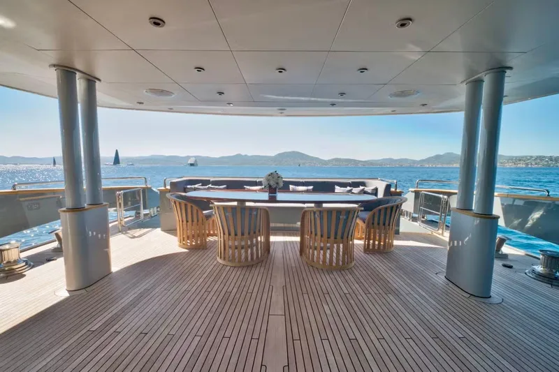  Yacht Photos Pics Luxurious 2007 Baglietto 43 yacht deck with elegant seating and ocean view.