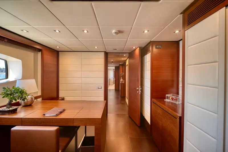  Yacht Photos Pics Luxurious interior of 2007 Baglietto 43 yacht with elegant wood and modern design.
