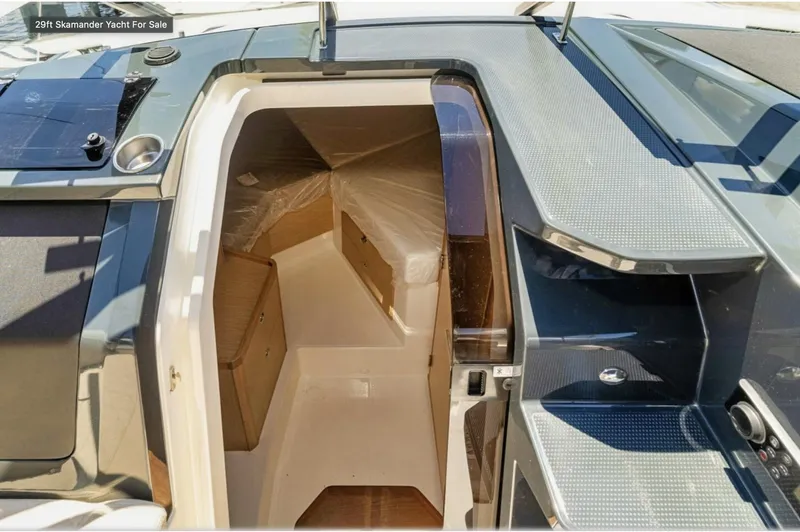  Yacht Photos Pics 2024 Skamander 850 Voyager yacht interior with modern design and sleek finishes.