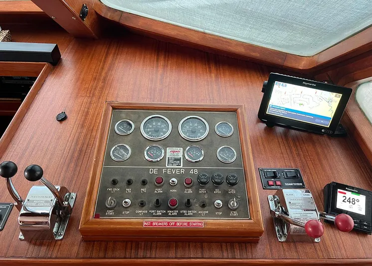  Yacht Photos Pics Control panel of a 1987 DeFever Tri-Cabin yacht with navigation instruments.