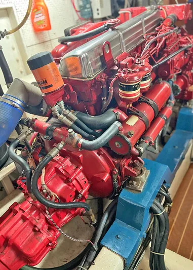  Yacht Photos Pics Engine of a 1987 DeFever Tri-Cabin boat, showcasing detailed mechanical components.