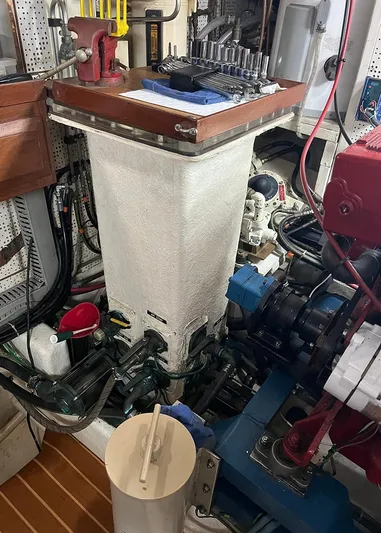  Yacht Photos Pics Engine room of 1987 DeFever Tri-Cabin boat with visible machinery and tools.