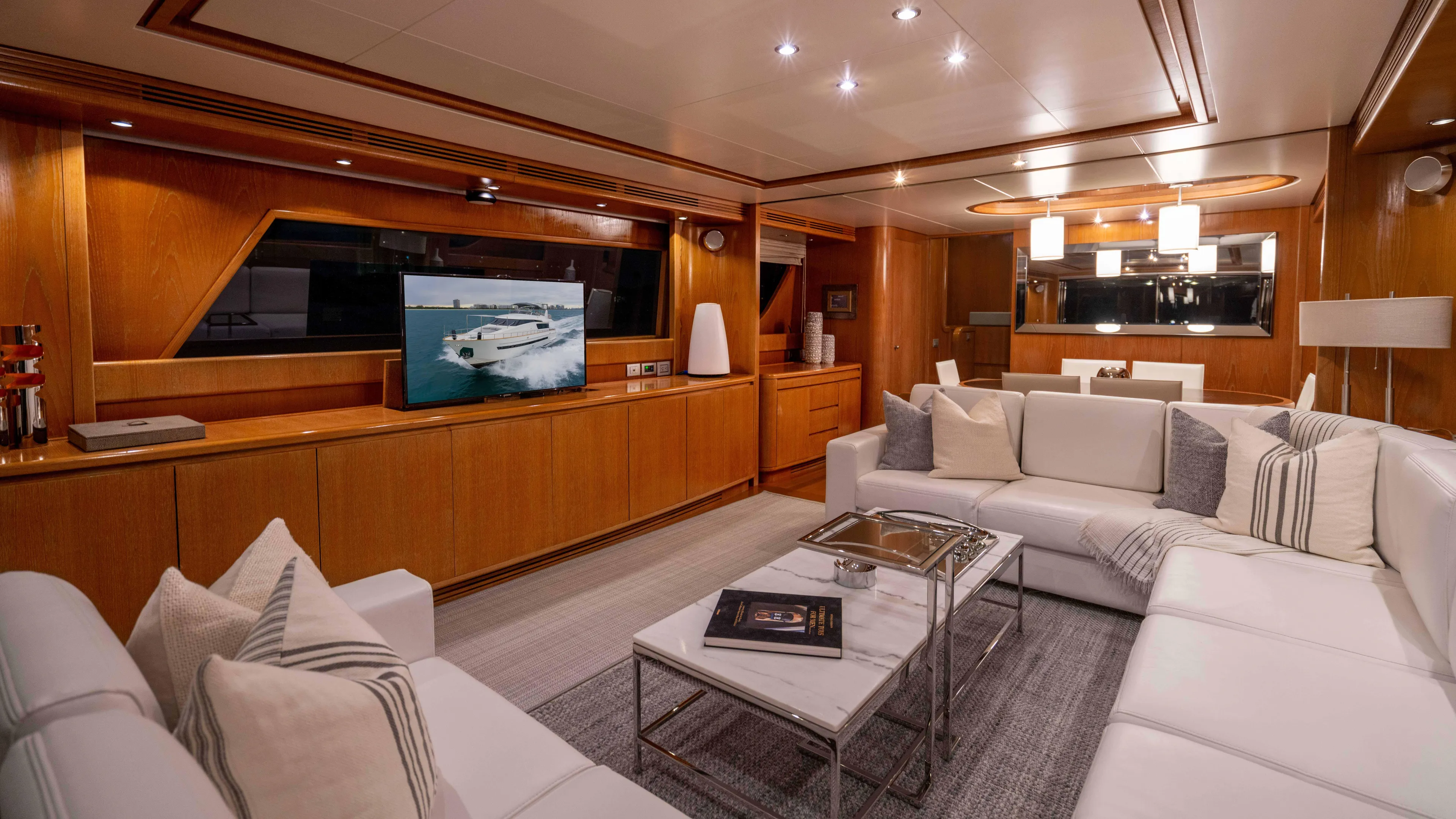 Losand Yacht Photos Pics Luxurious interior of 2005 Sanlorenzo SL82 yacht with elegant wood paneling and modern furnishings.