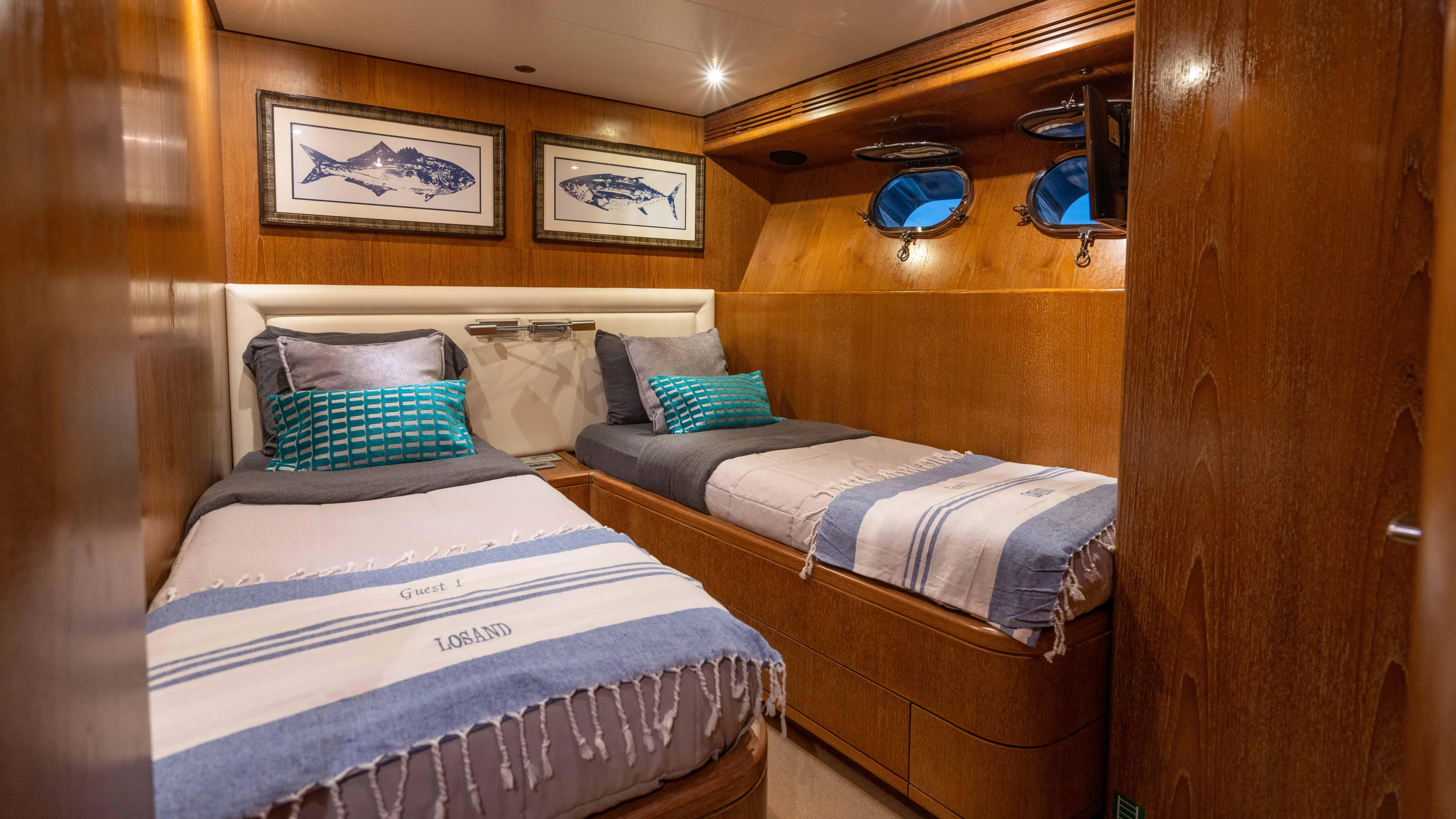 Losand Yacht Photos Pics Luxurious twin cabin on 2005 Sanlorenzo SL82 yacht with nautical decor.