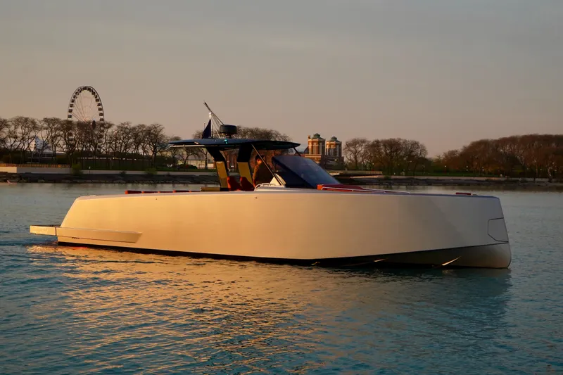  Yacht Photos Pics 2025 Pardo Yachts P43 cruising on serene waters at sunset.