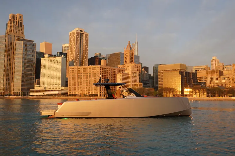  Yacht Photos Pics 2025 Pardo Yachts P43 cruising near city skyline at sunset.