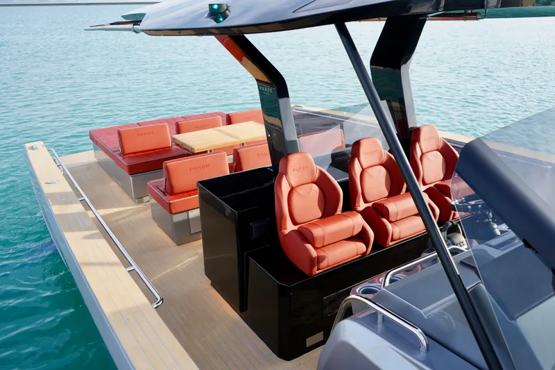  Yacht Photos Pics 2025 Pardo Yachts P43 luxury yacht interior with red seating and sleek design on blue water.