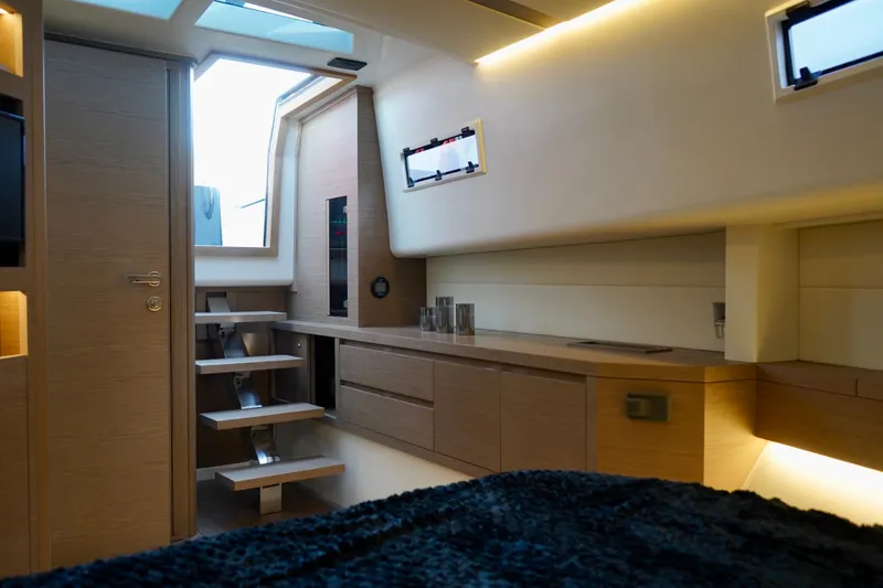  Yacht Photos Pics Luxurious interior of 2025 Pardo Yachts P43, featuring modern design and wooden finishes.