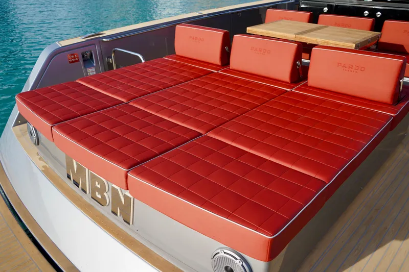  Yacht Photos Pics Luxurious red seating on 2025 Pardo Yachts P43, featuring elegant design and craftsmanship.