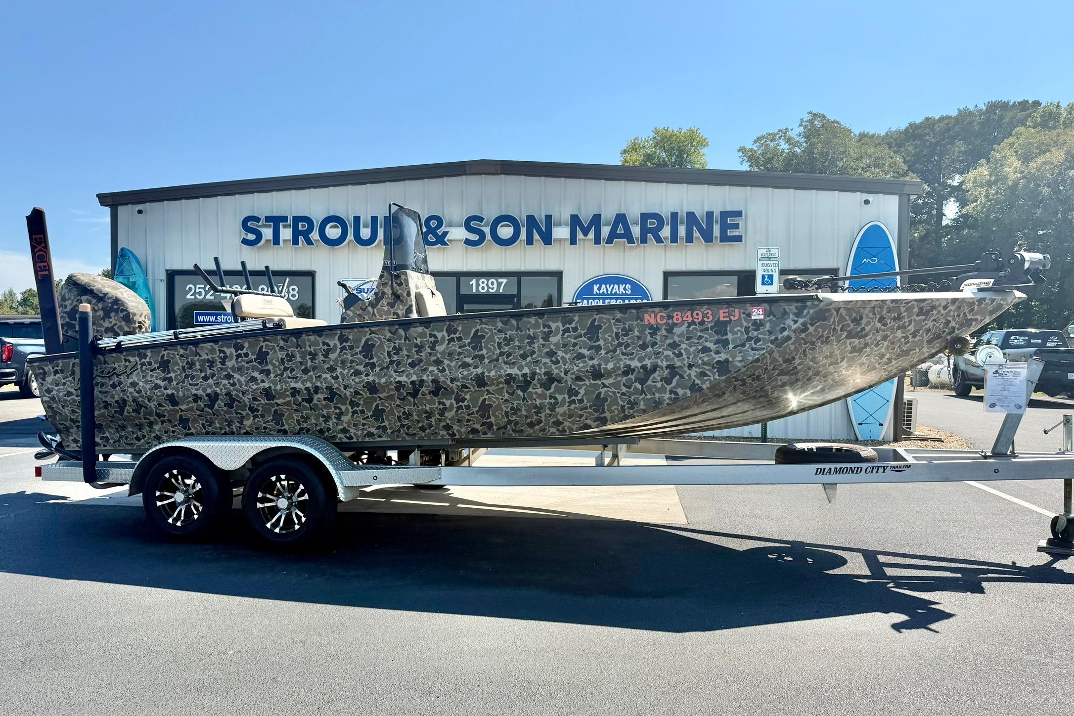 2019 Excel 230 Bay Pro boat on trailer at Stroud & Son Marine dealership.