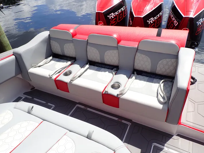  Yacht Photos Pics 2024 Statement 350 Open boat seating with red and gray upholstery, cup holders, and powerful engines.