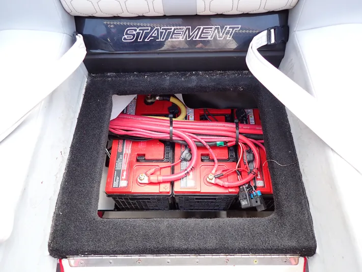  Yacht Photos Pics 2024 Statement 350 Open boat battery compartment with red cables.