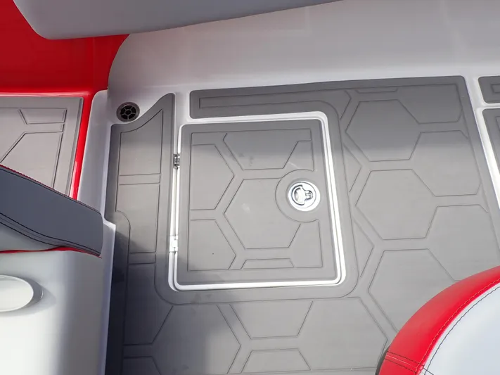  Yacht Photos Pics 2024 Statement 350 Open boat deck with hexagonal pattern and red accents.