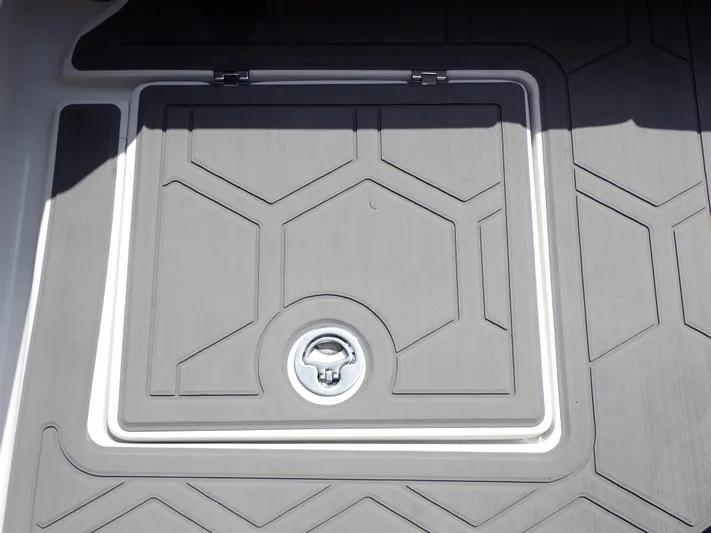  Yacht Photos Pics 2024 Statement 350 Open boat deck with geometric pattern and hatch.