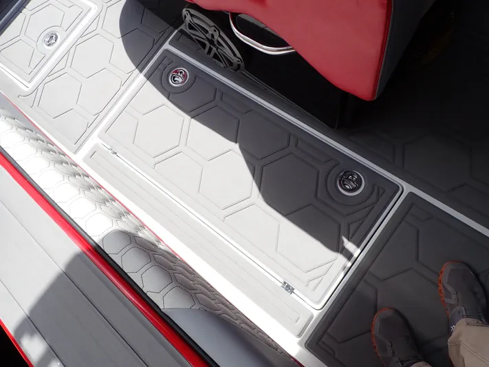  Yacht Photos Pics 2024 Statement 350 Open boat deck with hexagonal pattern and red seating.