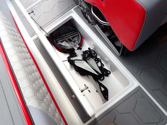  Yacht Photos Pics 2024 Statement 350 Open boat storage compartment with anchor and rope.