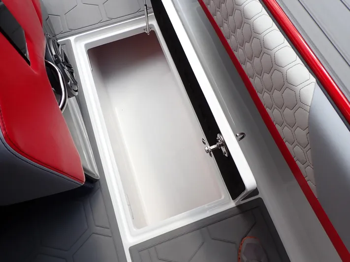  Yacht Photos Pics 2024 Statement 350 Open boat interior with storage compartment and red accents.