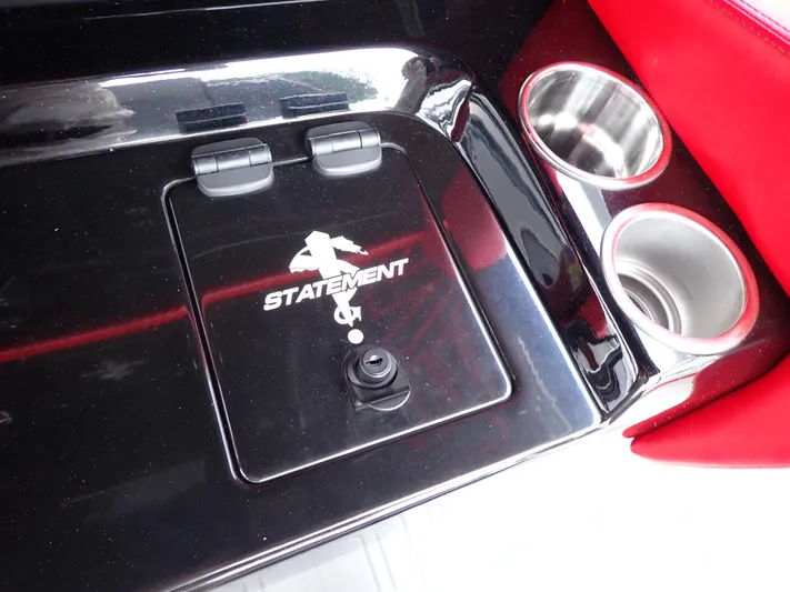  Yacht Photos Pics 2024 Statement 350 Open boat console with cup holders and storage compartment.