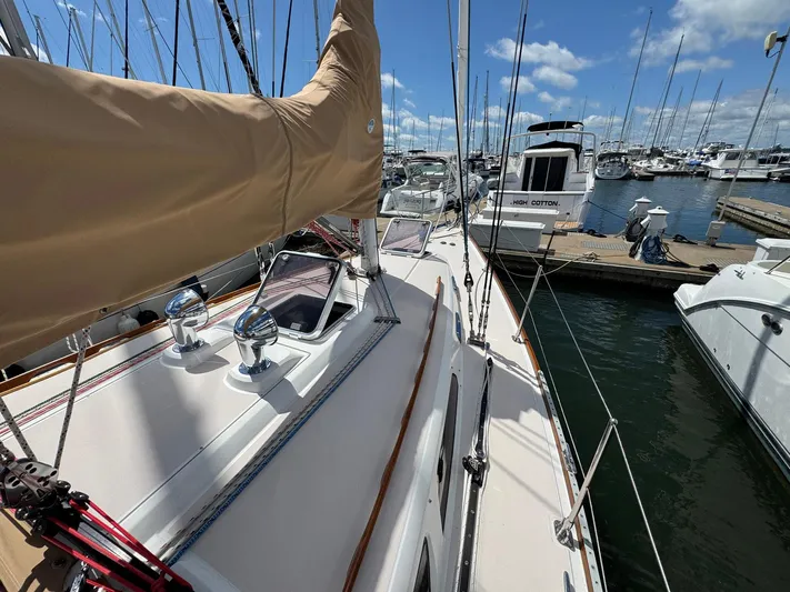 Delta Sand Yacht Photos Pics Sailboat Sabre 362, 2000 model, docked at marina with clear skies and calm waters.