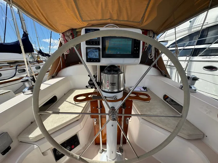 Delta Sand Yacht Photos Pics Steering wheel and navigation equipment on a 2000 Sabre 362 sailboat.