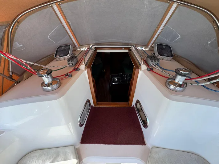 Delta Sand Yacht Photos Pics Interior view of a 2000 Sabre 362 sailboat cockpit with winches and ropes.