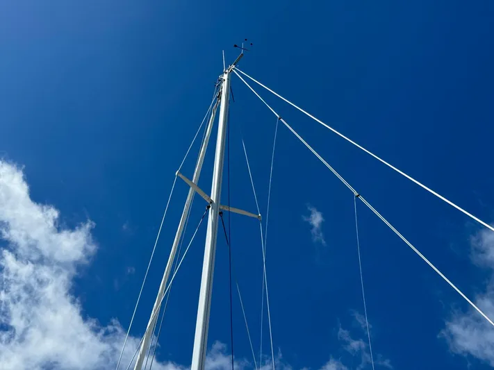 Delta Sand Yacht Photos Pics Sailboat mast against blue sky, Sabre 362, 2000 model.