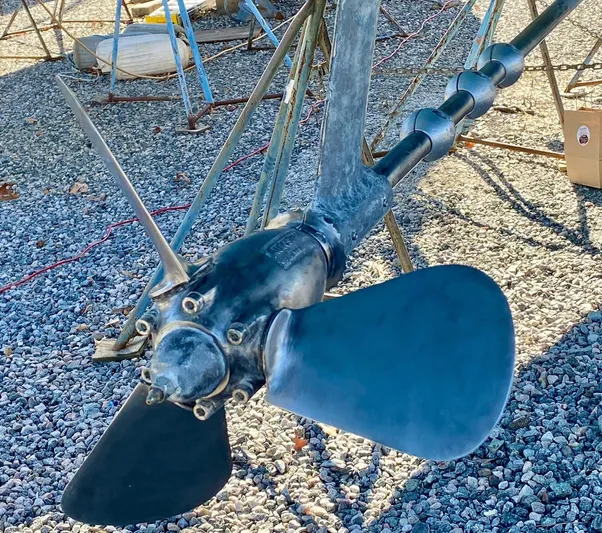 Delta Sand Yacht Photos Pics Propeller of a 2000 Sabre 362 sailboat on gravel surface.
