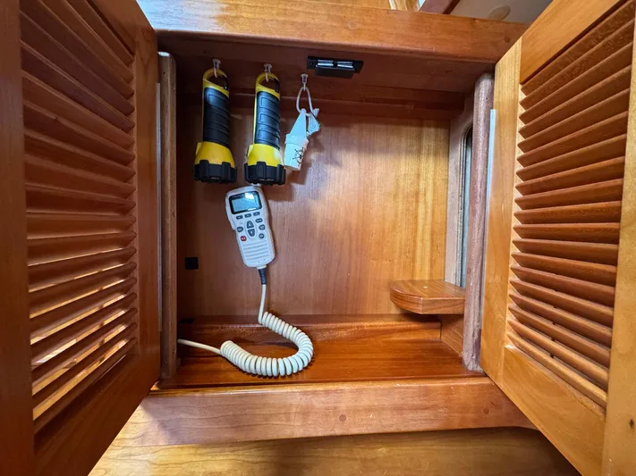 Delta Sand Yacht Photos Pics Wooden cabinet with radio and flashlights inside a 2000 Sabre 362 sailboat.