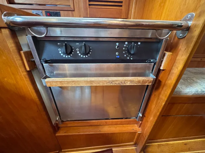 Delta Sand Yacht Photos Pics Stainless steel oven in 2000 Sabre 362 yacht galley with wooden accents.