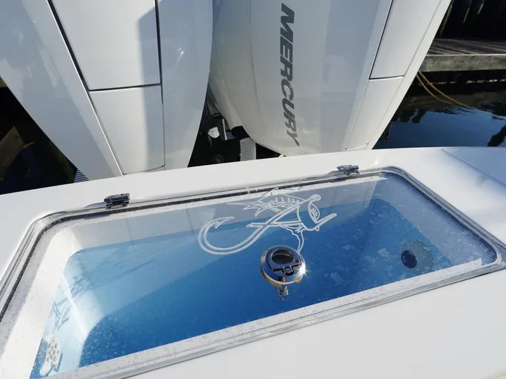  Yacht Photos Pics 2024 Albemarle 30 Express boat with Mercury engines and a glass hatch.