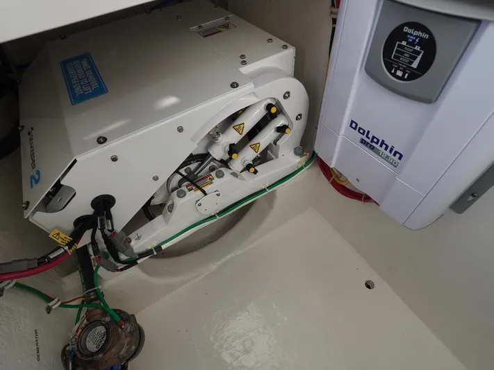  Yacht Photos Pics 2024 Albemarle 30 Express engine compartment with Dolphin marine equipment.