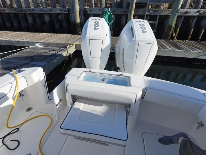  Yacht Photos Pics 2024 Albemarle 30 Express boat with dual outboard engines at dock.