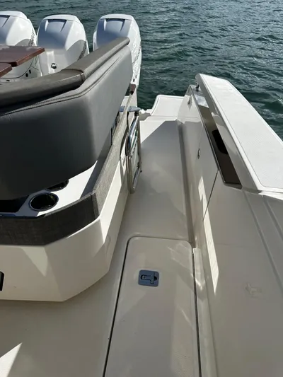  Yacht Photos Pics 2020 Tiara Yachts 38 LS boat deck with seating and outboard motors.