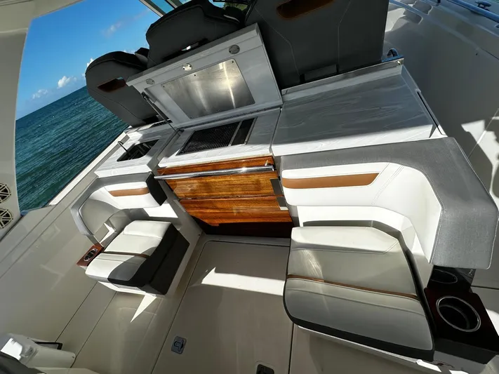  Yacht Photos Pics 2020 Tiara Yachts 38 LS interior with luxurious seating and sleek design.