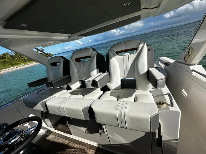  Yacht Photos Pics Luxury seating on 2020 Tiara Yachts 38 LS, overlooking serene ocean view.
