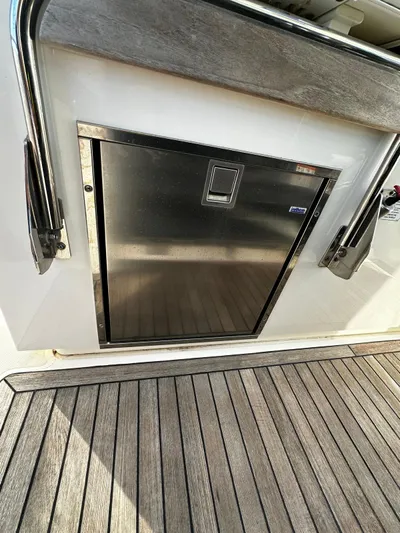  Yacht Photos Pics 2020 Tiara Yachts 38 LS with stainless steel storage compartment on deck.