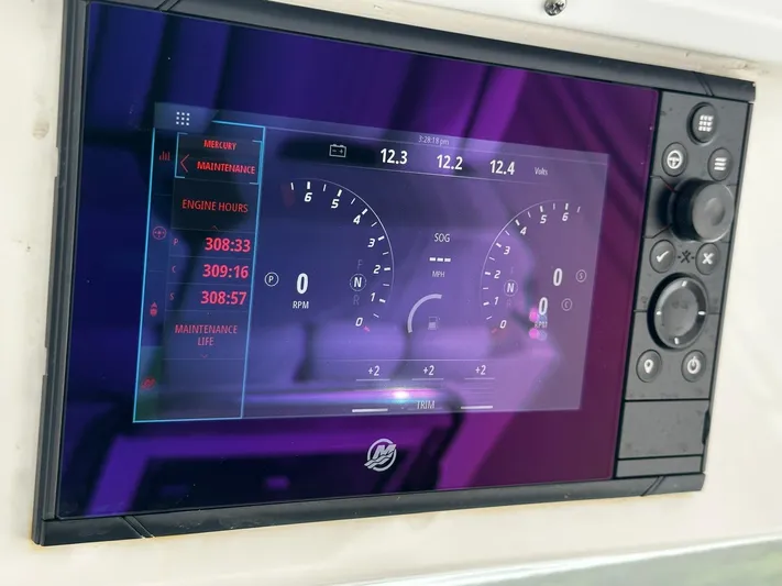  Yacht Photos Pics 2020 Tiara Yachts 38 LS dashboard display showing engine metrics and maintenance alerts.