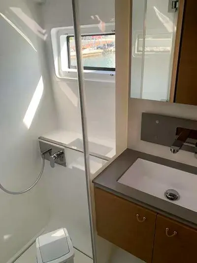  Yacht Photos Pics Modern bathroom in 2023 Excess 15 yacht with shower and sink.