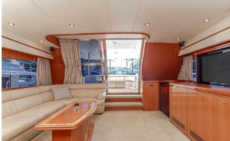  Yacht Photos Pics Luxurious interior of a 2005 Johnson 70 yacht with elegant seating and wood finishes.